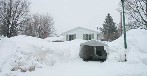 neighborhood buried in snow