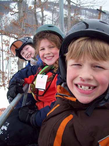kids ride snowlift whitetail ski resort